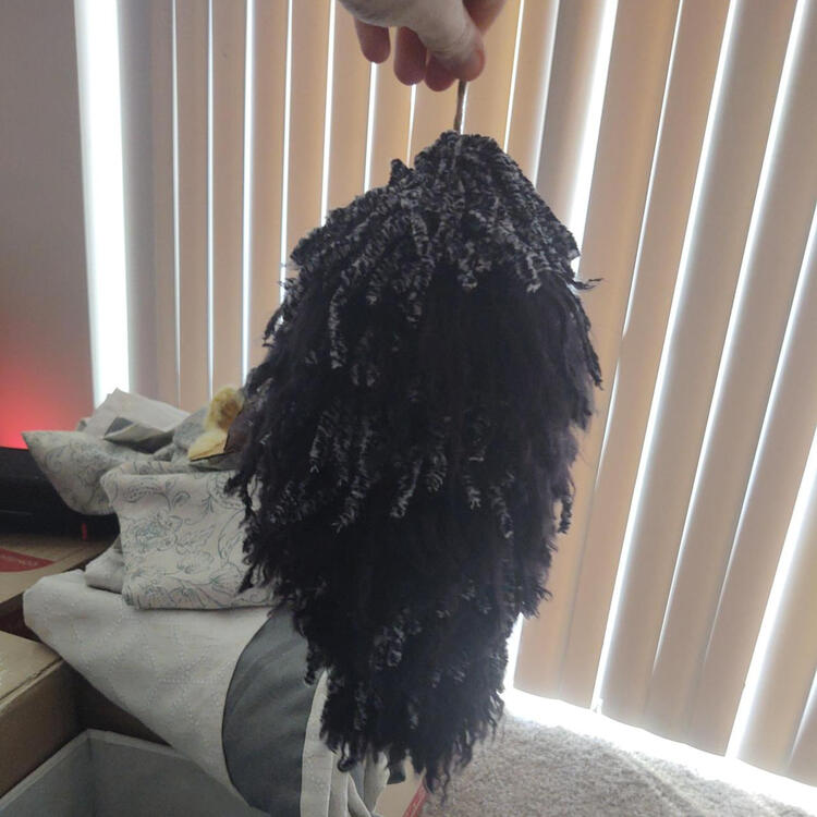 BLACK AND WHITE YARN TAIL